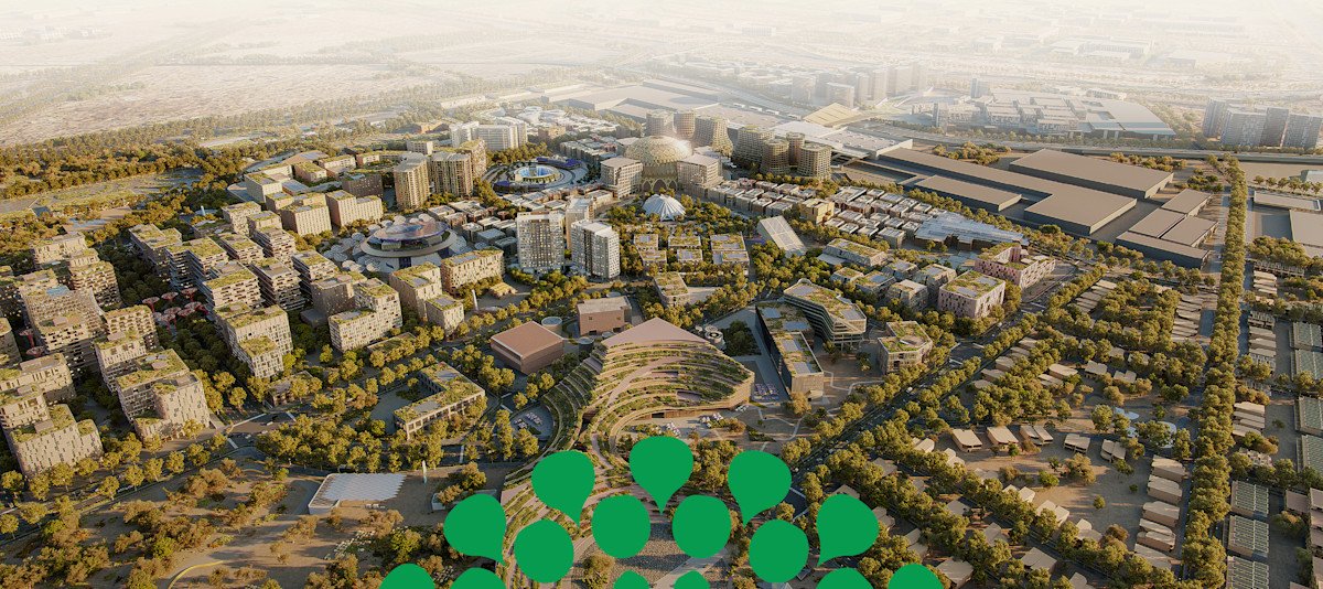 Aerial view of a masterplanned district with low-rise buildings