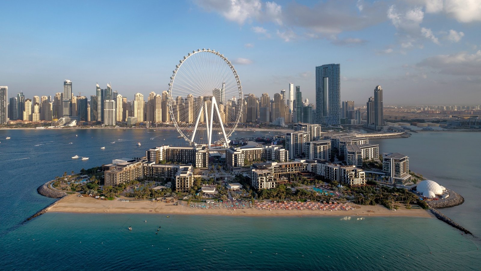 Aerial view of Bluewaters Island with the Ain Dubai wheel and the Dubai Marina skyline