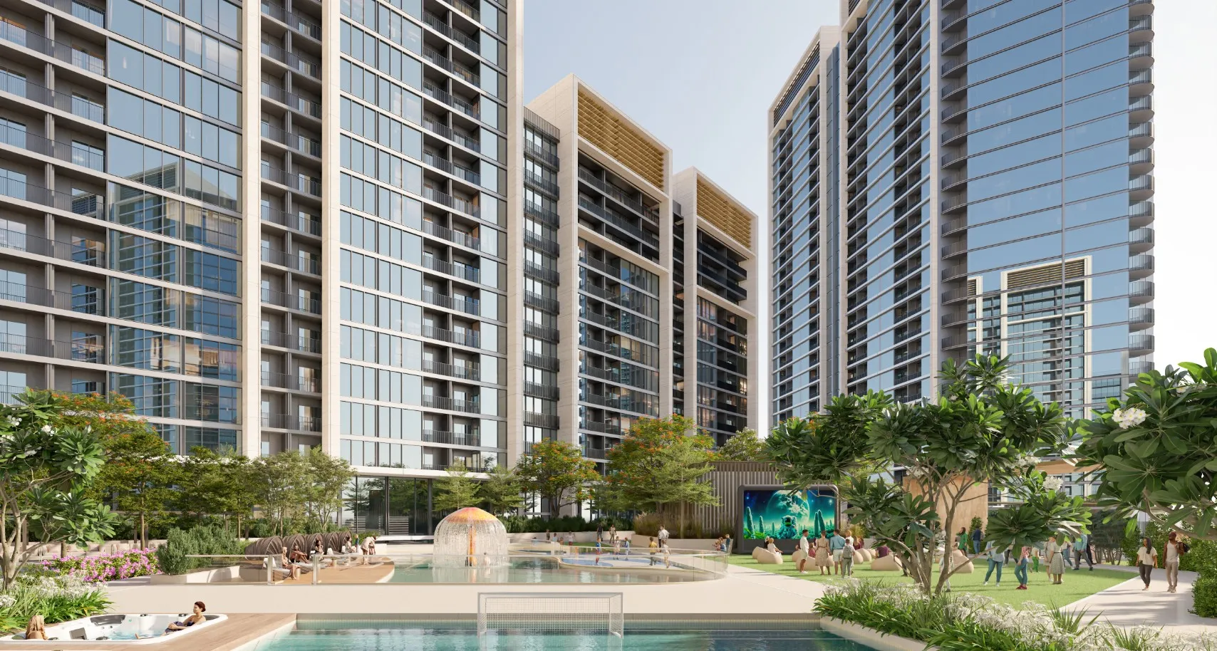 Residential towers with landscaped gardens and a pool in the foreground