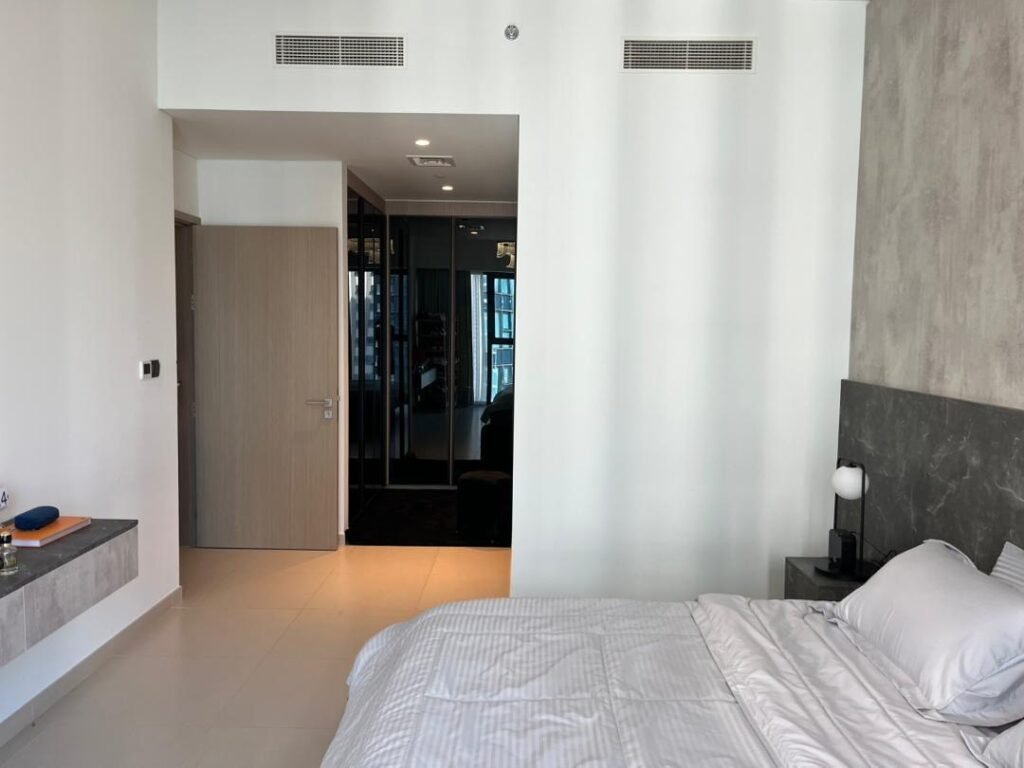 BLVD Central — 1 Bed — bedroom and walk-in wardrobe