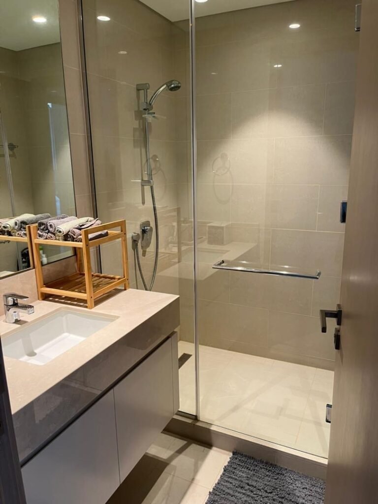 BLVD Central — 1 Bed — bathroom with glass shower