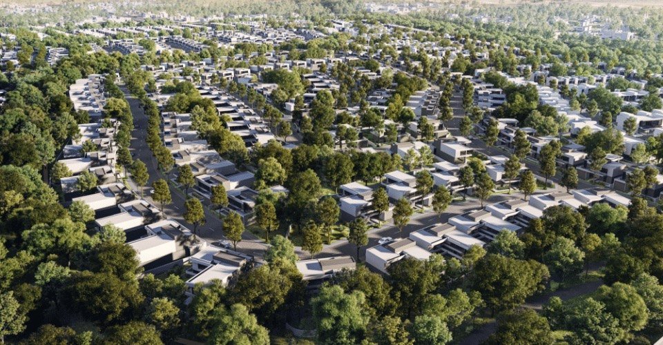 Aerial view of a low-rise villa community among trees, rendered view