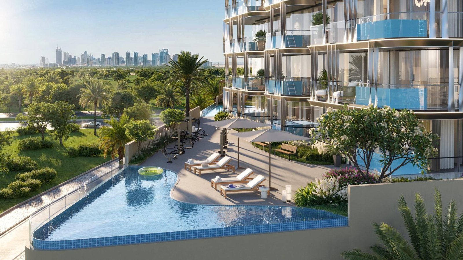 Landscaped infinity pool with sun loungers beside a curved balcony tower and green parkland, rendered view