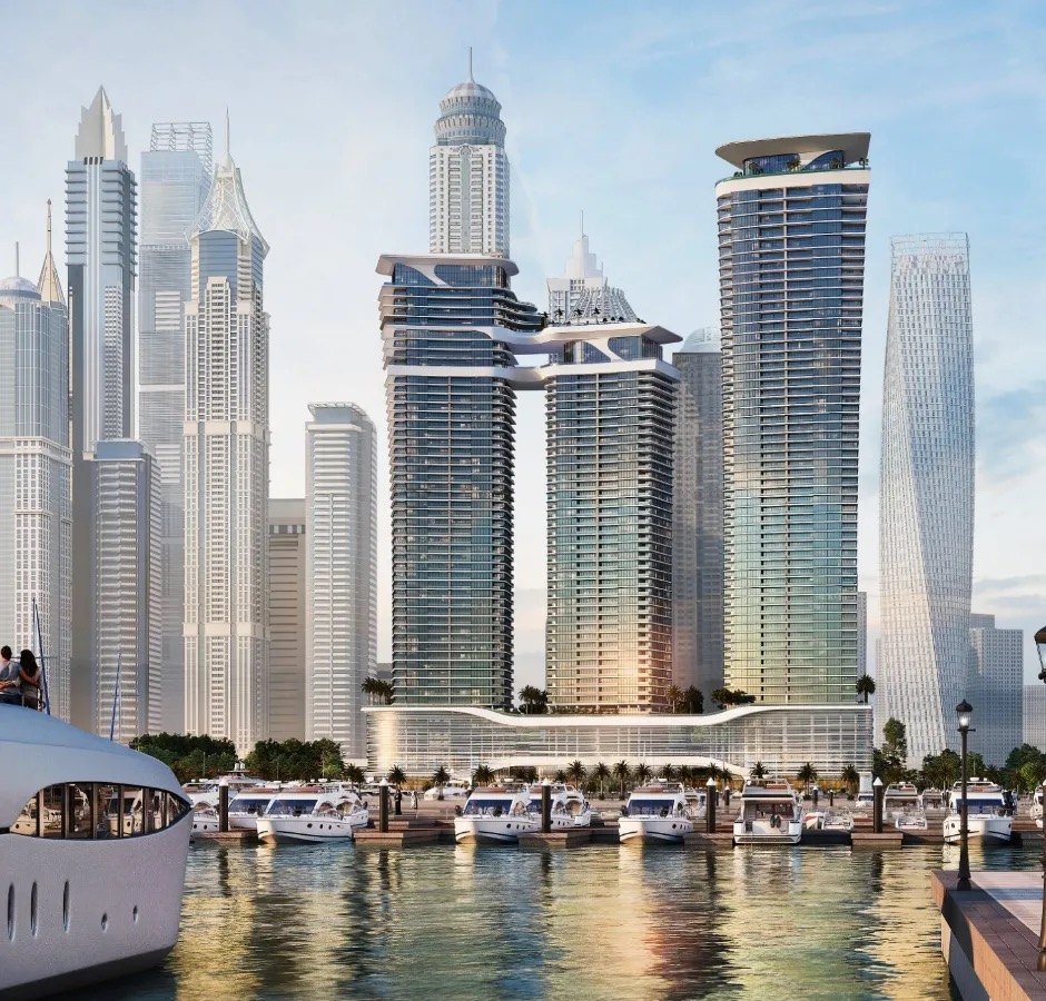 Waterfront residential towers beside a marina with boats at dusk, rendered view